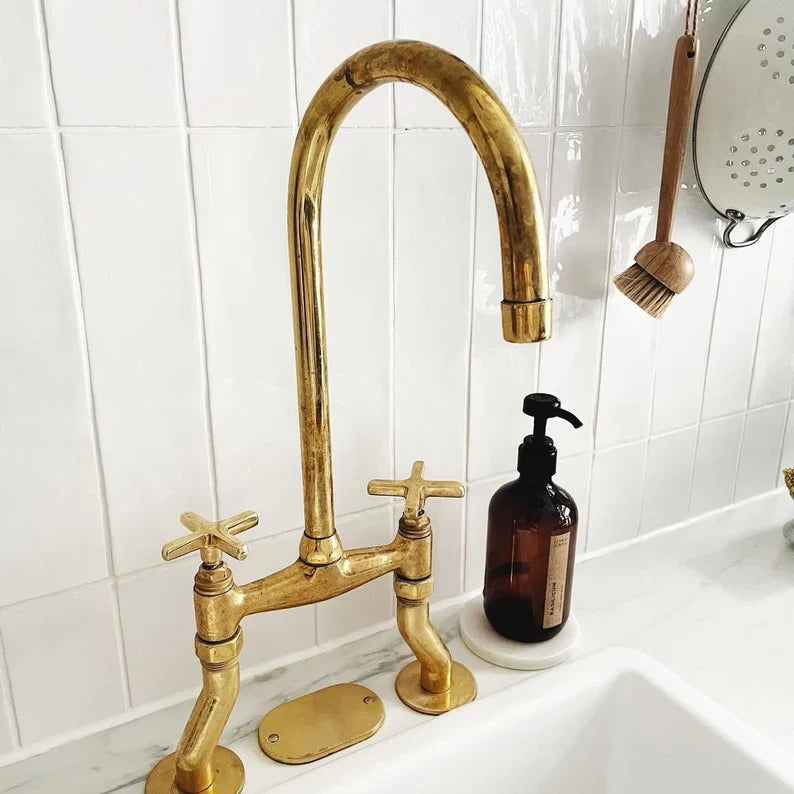 Unlacquered Brass curved legs bridge faucet
