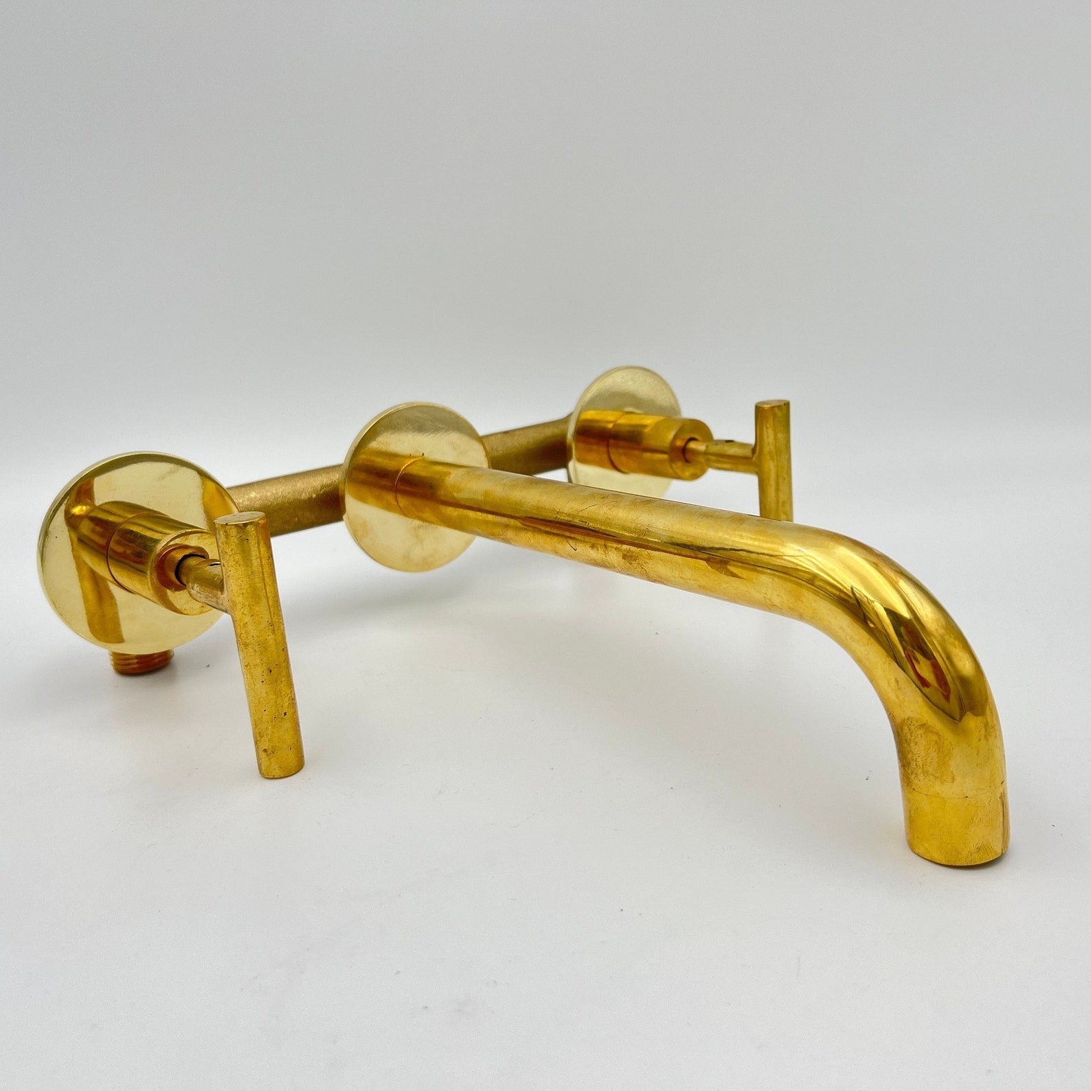 Unlacquered Brass Bathroom Faucet With Lever Handles